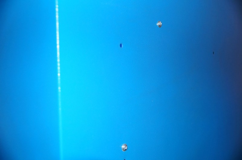 Bolted in from the bottom with M4 bolts and a washer