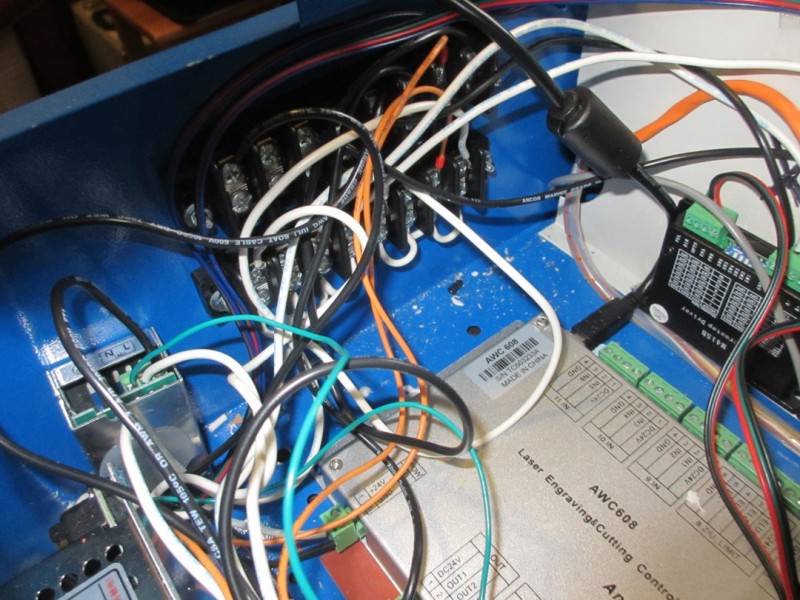 Front of electronics bay.  With the terminal blocks, the right half of each is getting AC from wall, the left half is getting 24V from power supply.
