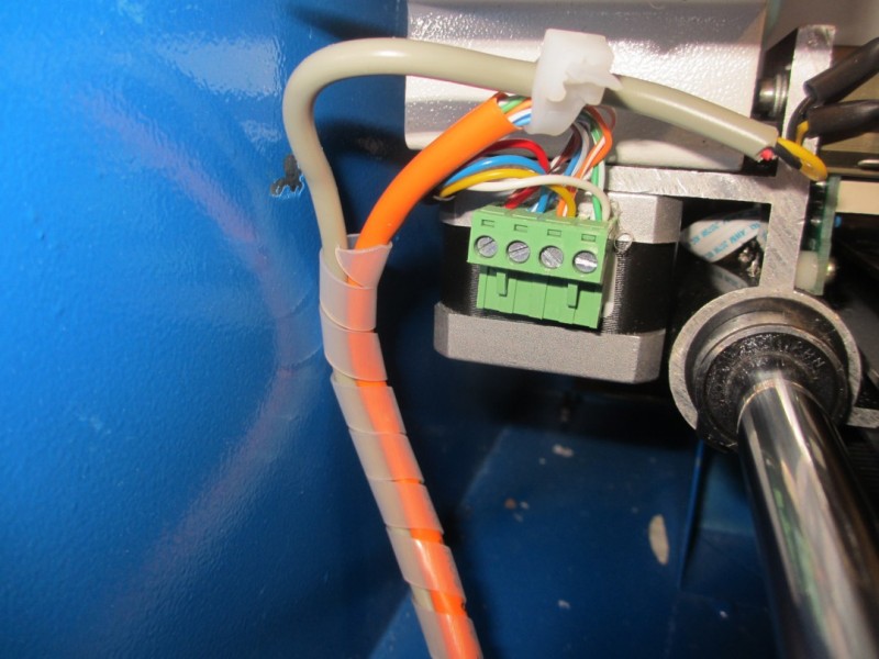 X motor with Cat-5 adapter to motor wires.  Hot-glued in place.